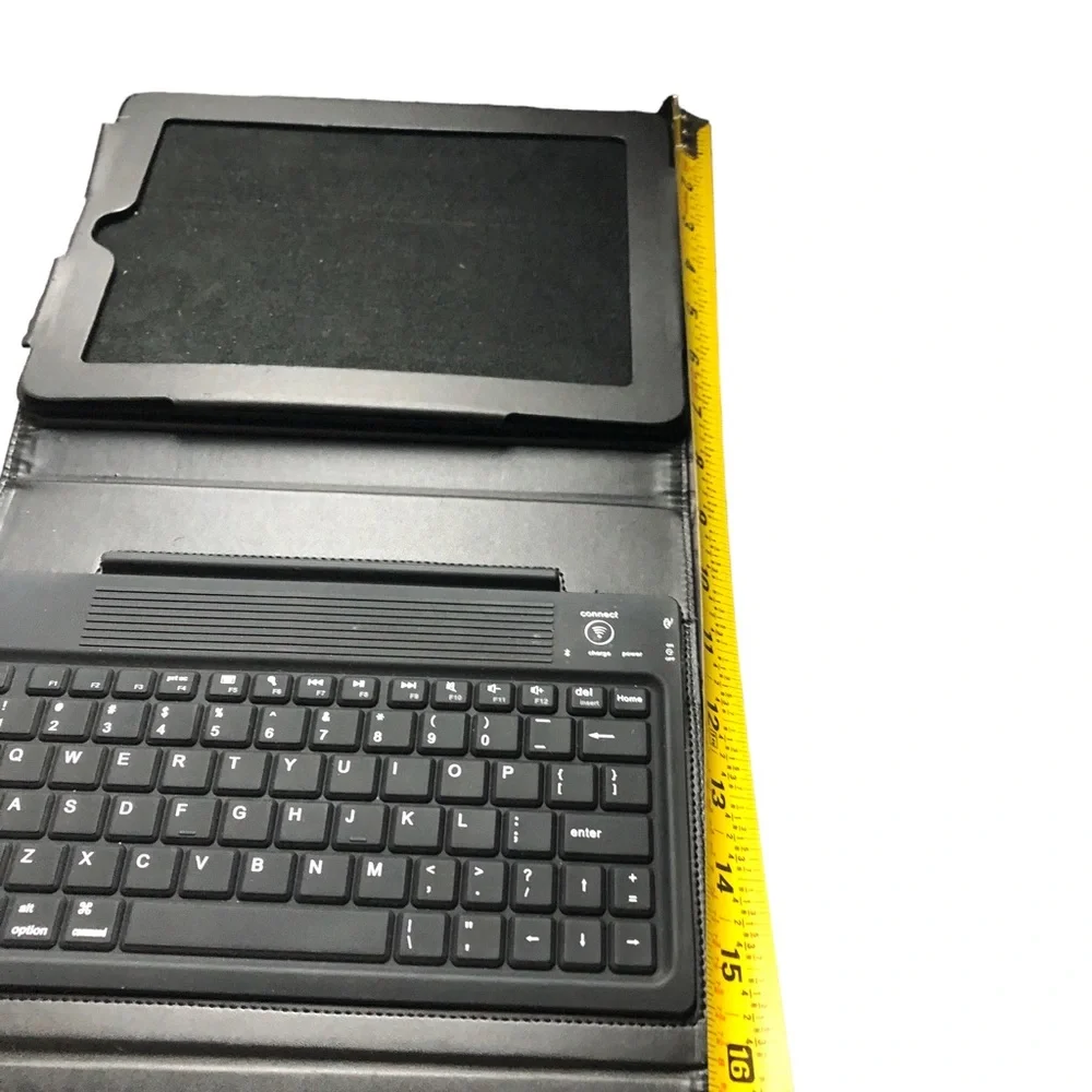 BROOKSTONE IPad cover, keyboard and stand. Black Leather